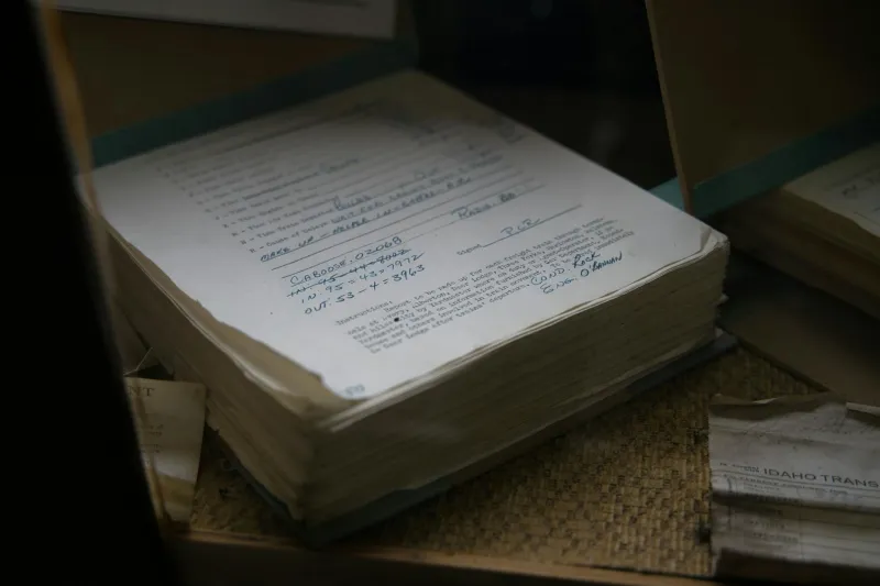 Room 9 Never Checks Out — Twenty Years of the Same Signature on a Dead Man's Registry